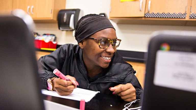 A student completes an assignment, giving her teacher valuable data to enhance learning