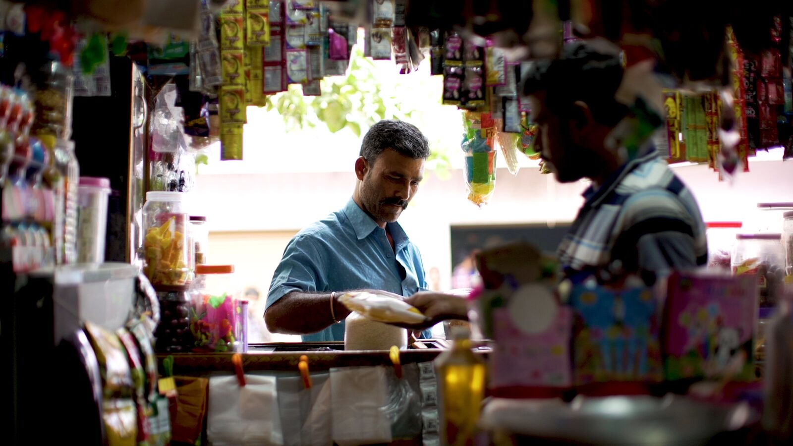 An Indian banking customer goes shopping thanks to accessible financial services