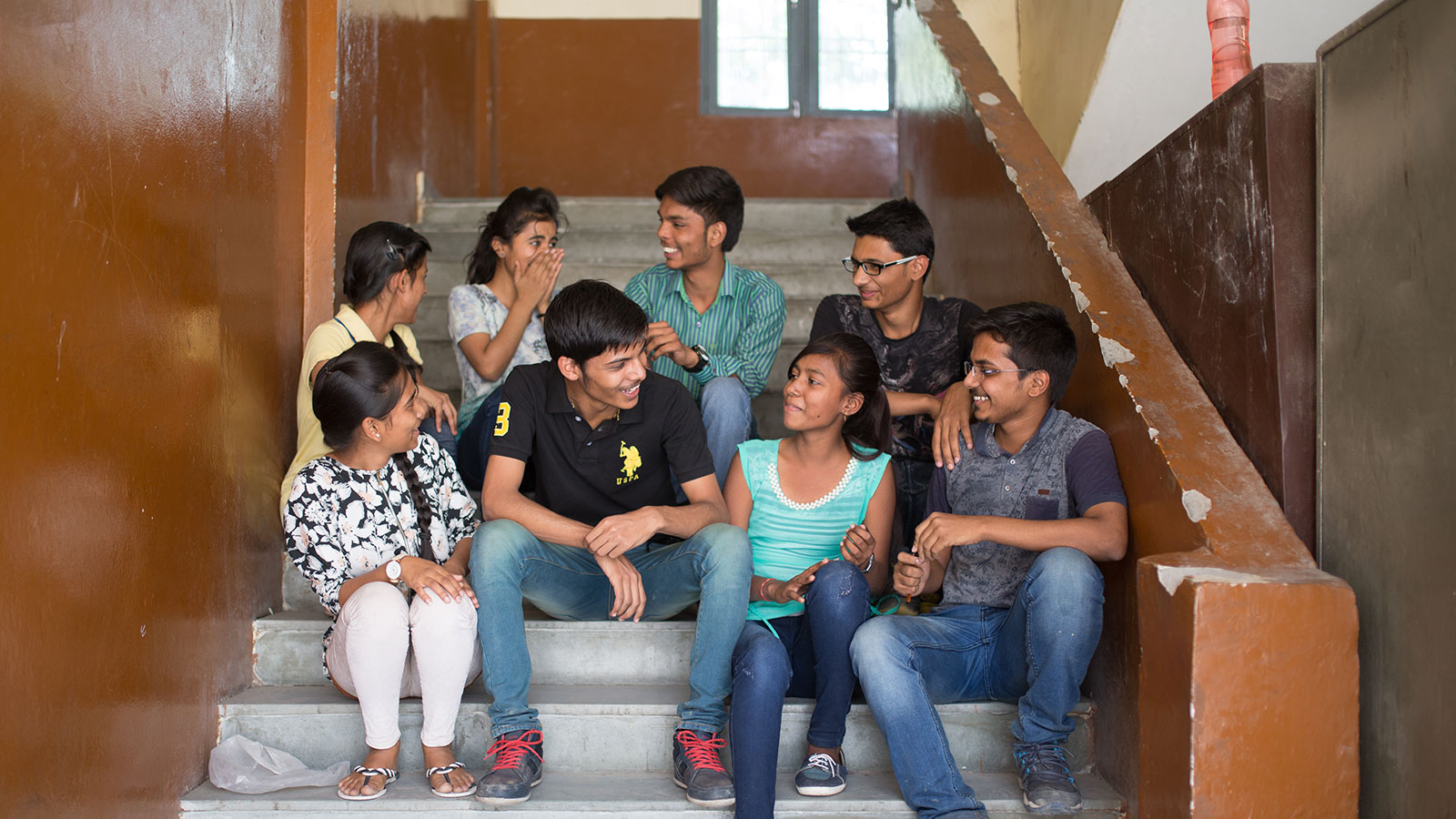 Indian students at school benefit from impact investing