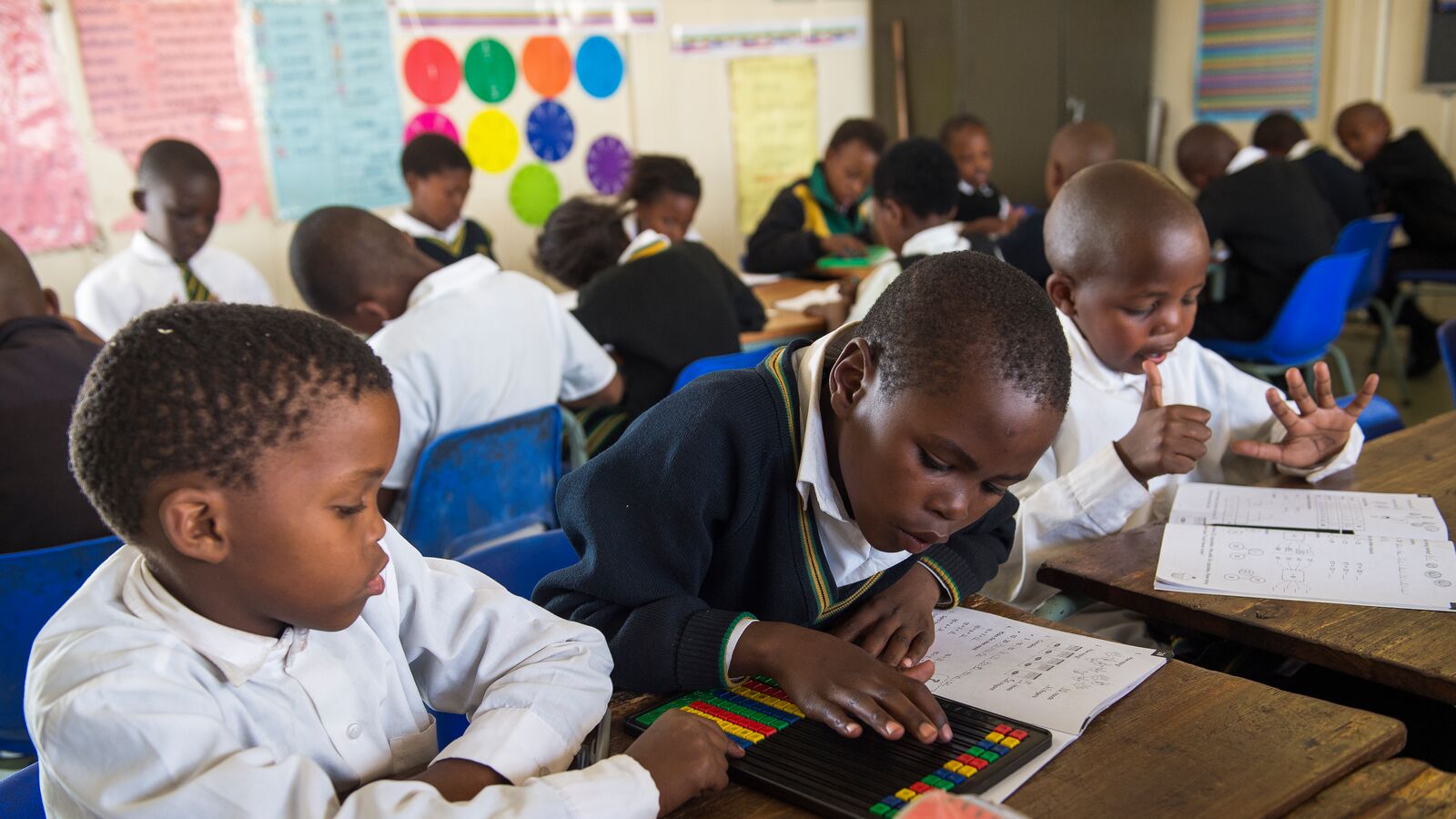 Students using a tablet in South Africa