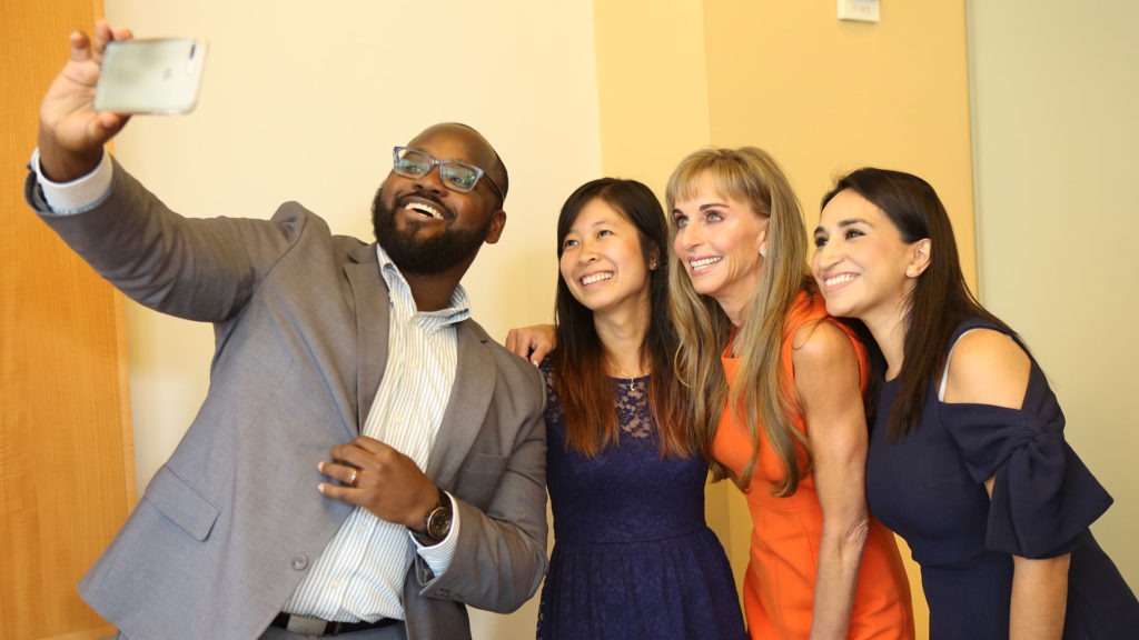 Susan Dell takes a selfie with Dell Scholars alumni