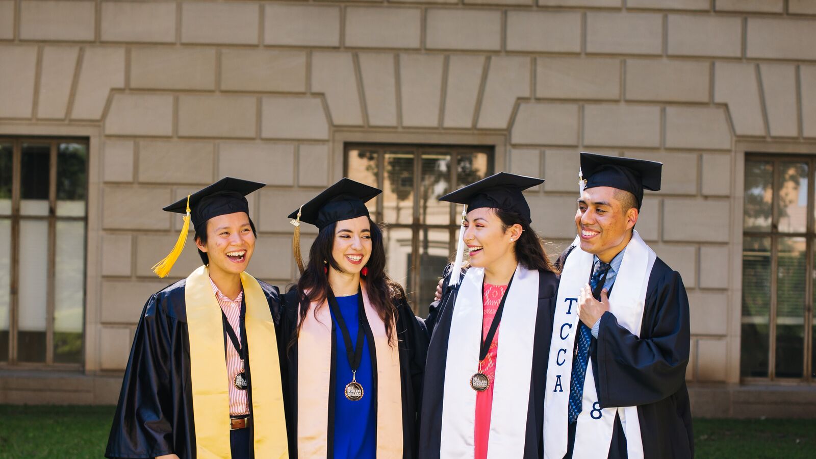 Dell Scholars in cap and gown closing the graduation gap