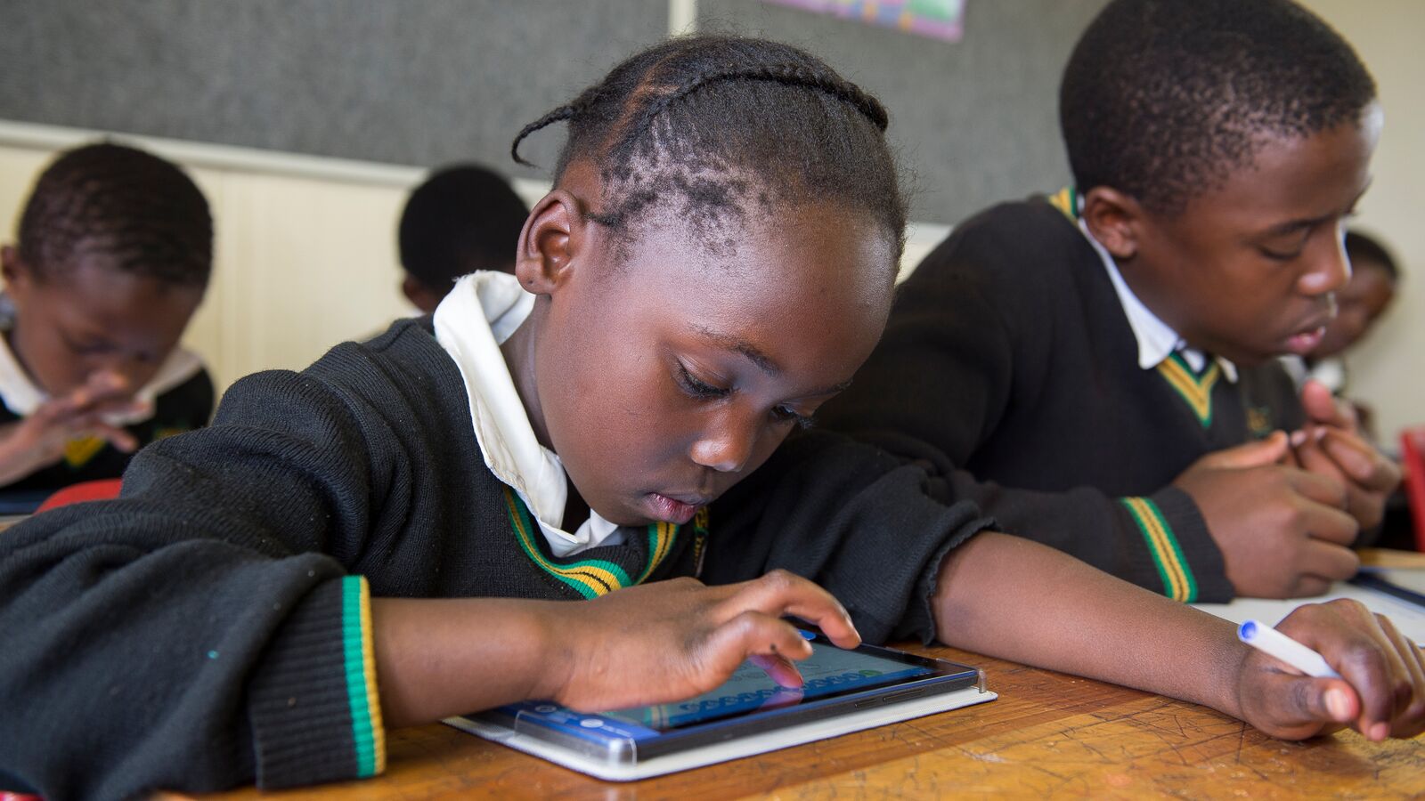 JumpStart learner using a tablet.