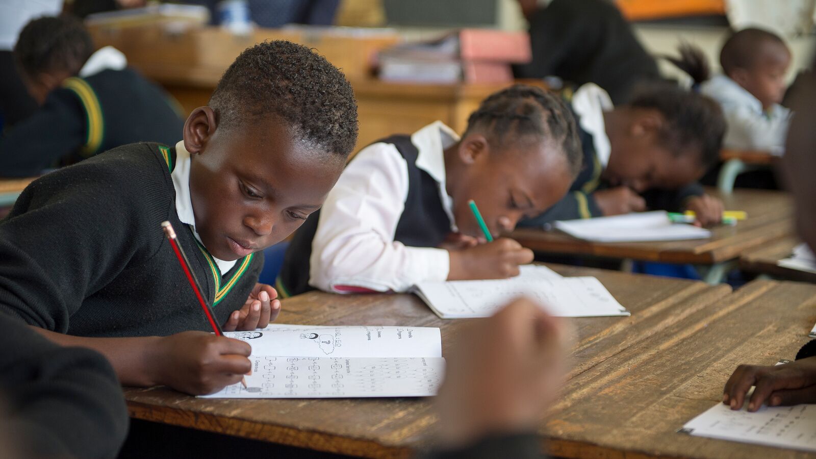 Students in South Africa work at their desks