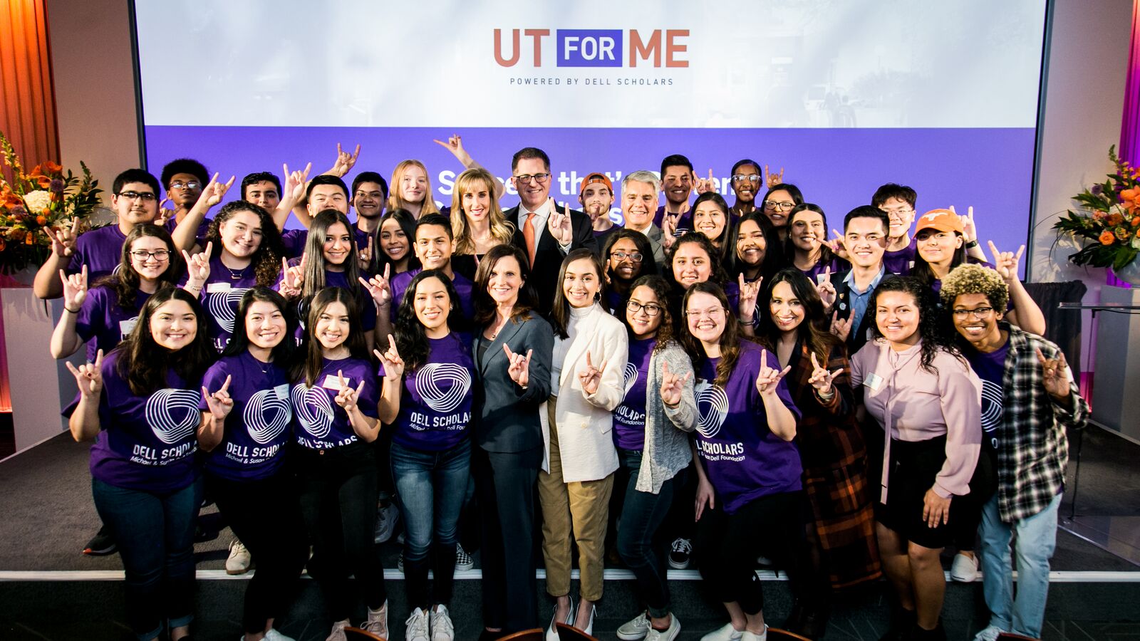 Dell Scholars stand with UT Austin leadership and Michael & Susan Dell Foundation leadership