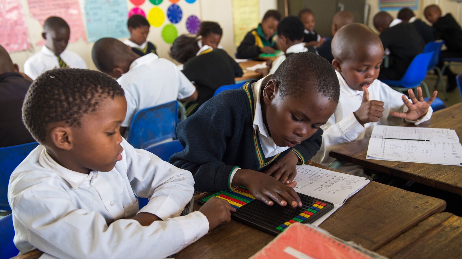 Students work on their math skills in a South African classroom.