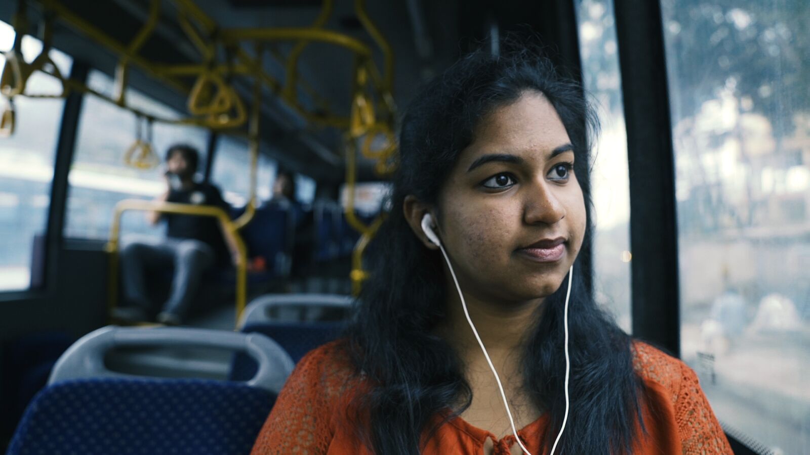 Foundation for Excellence scholarship recipient Supreeta rides a bus in India.