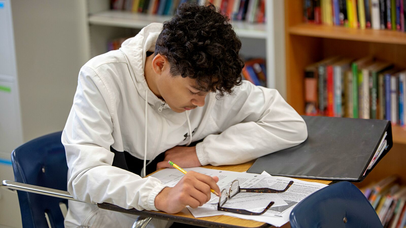 A Central Texas student studies in an advanced level math course