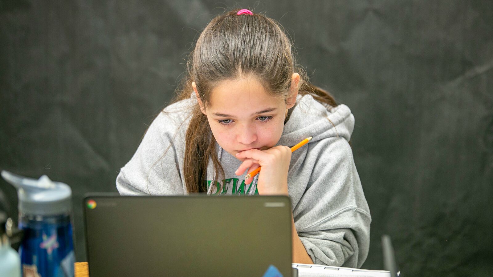 A Central Texas student studies in an advanced level math course