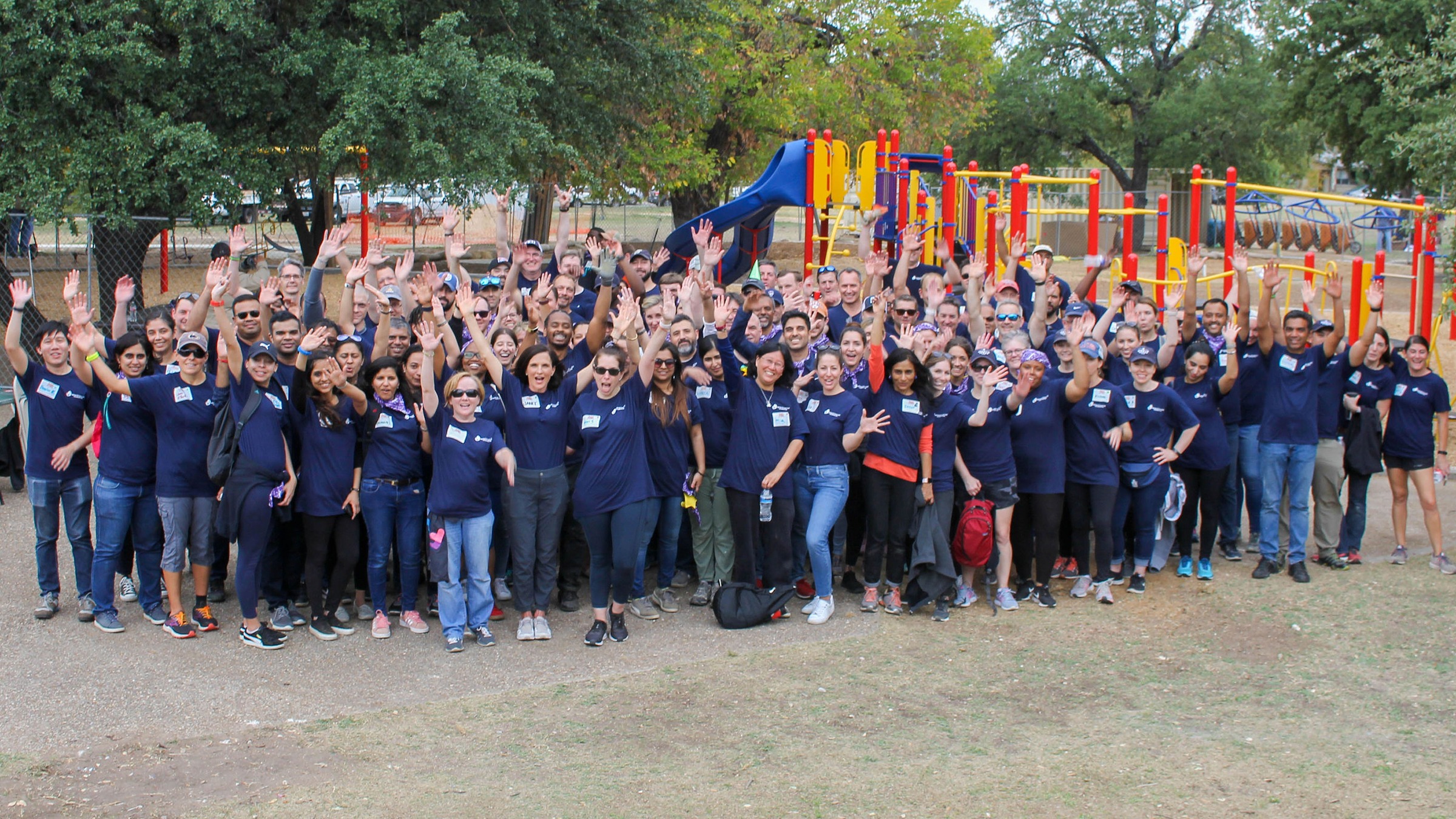 The Dell Foundation team celebrate the completion of a volunteer event.
