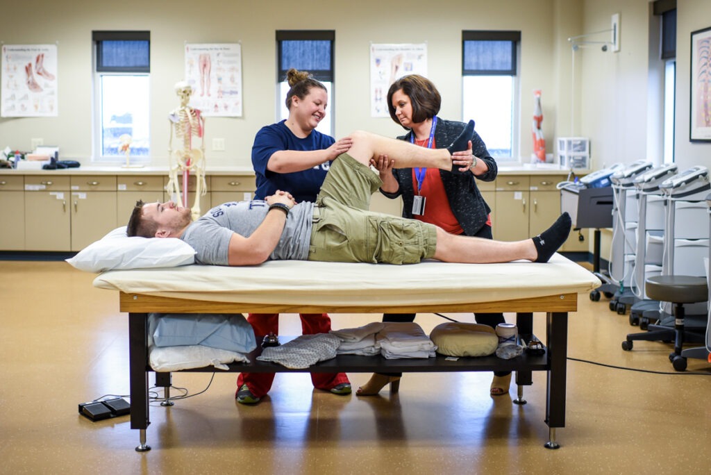 A Physical Therapist Assistant student in class. The program works closely with the nearby hospitals to provide clinical experiences and job opportunities.