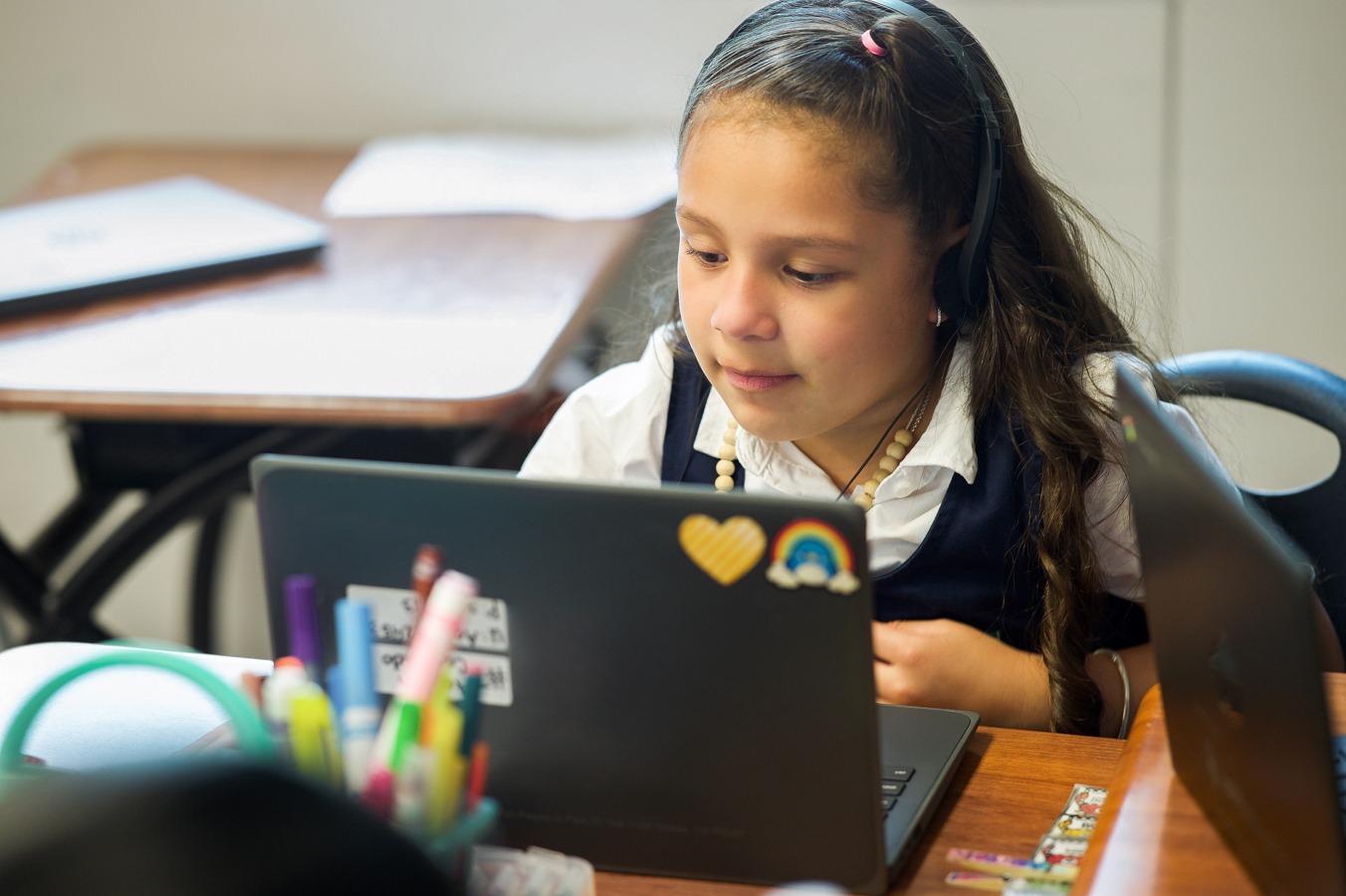 An OnYourMark tutoring student on her computer.