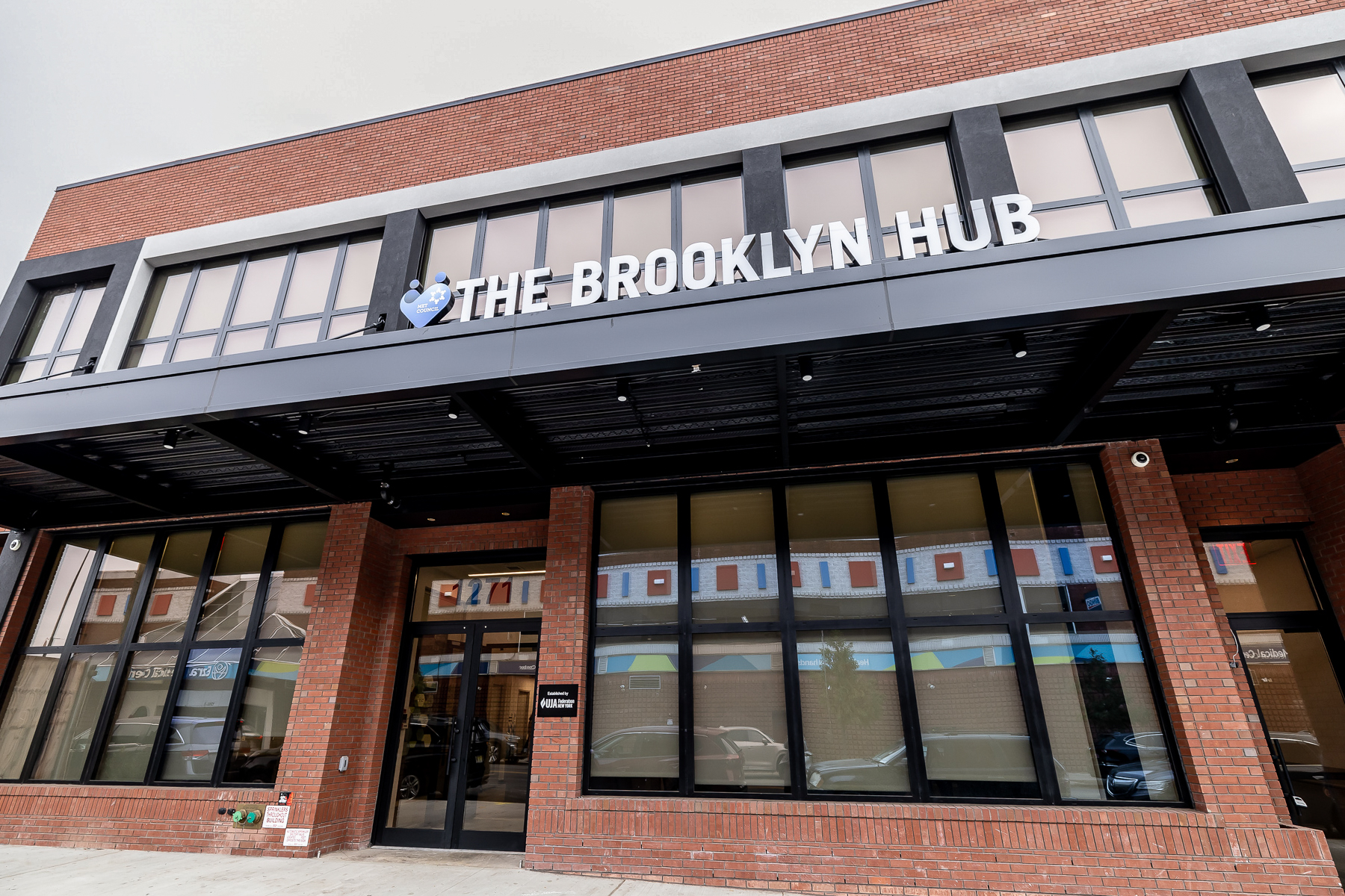 The entrance to the UJA Brooklyn Hub welcomes Jewish New Yorkers seeking support services.
