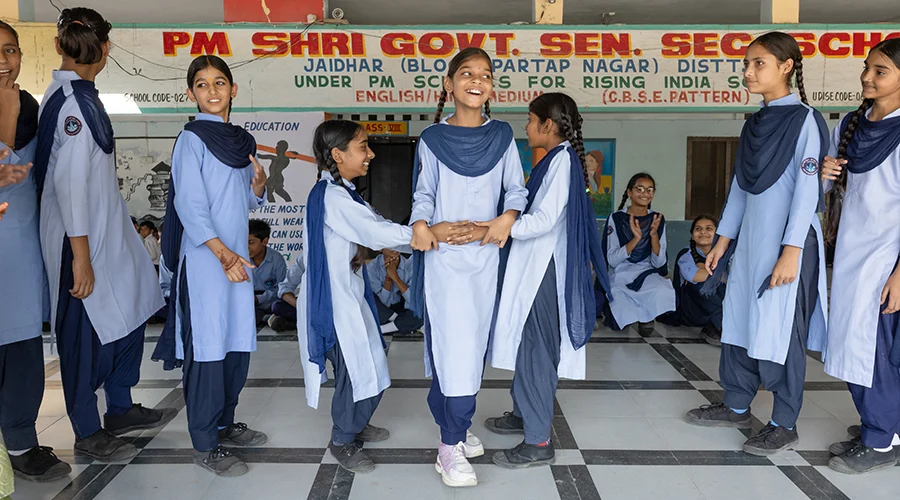 Students play a game together at school.