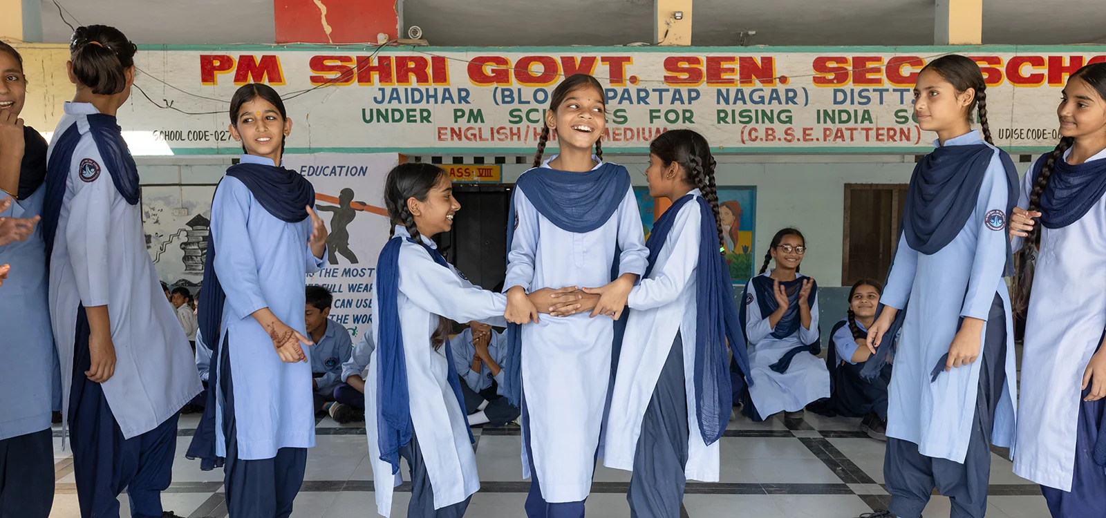 Students play a game together at school.